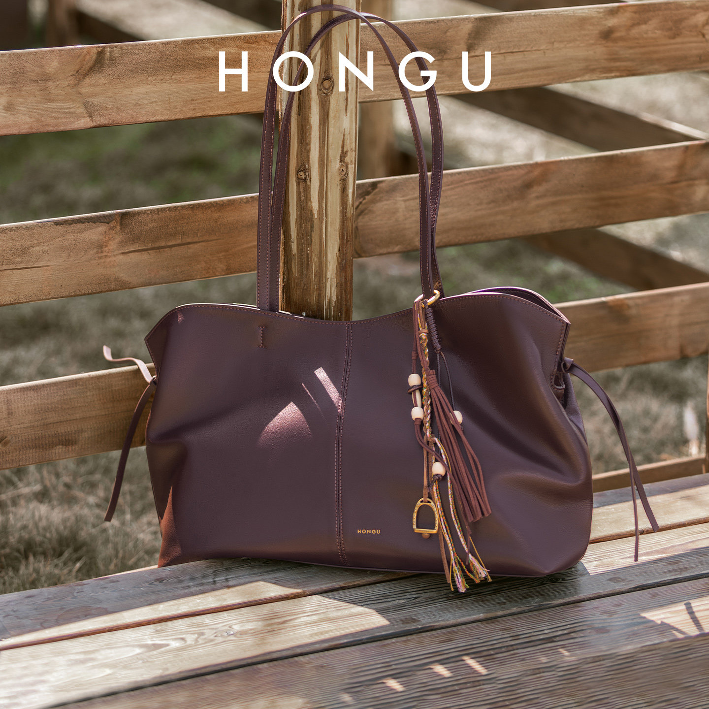 红谷包包2026新款质感真皮单肩腋下包通勤大容量手提托特包女士包