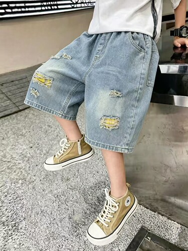 黄格子破洞牛仔中裤