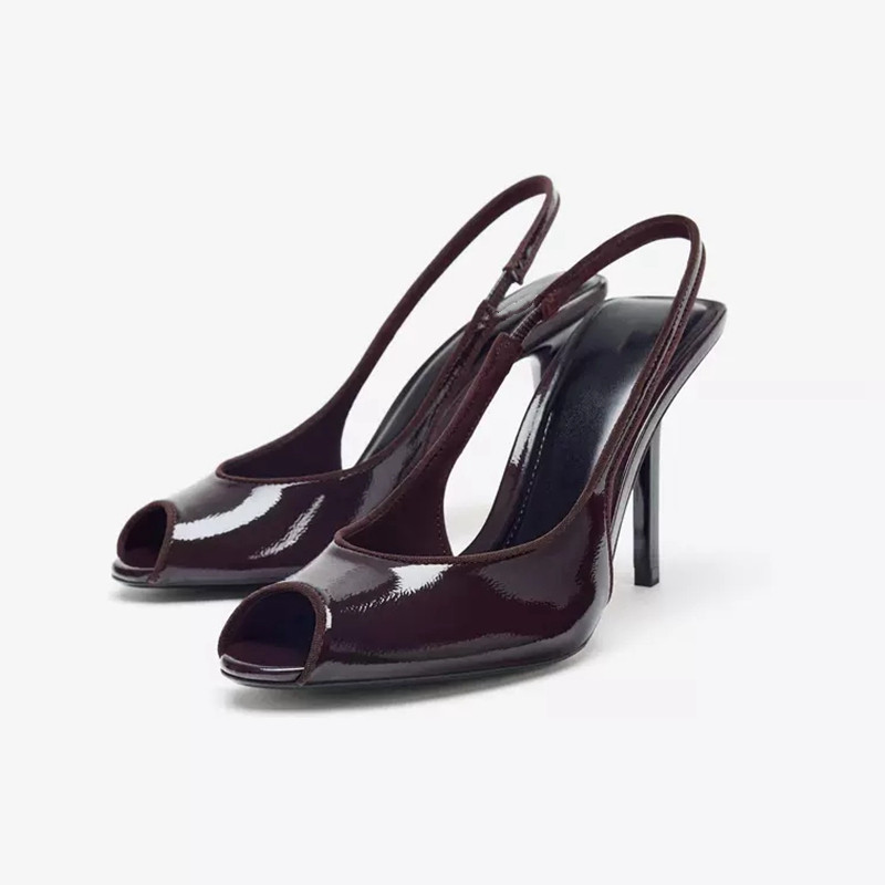 西班牙2025秋季性感鱼嘴中空欧美单鞋黑色漆皮效果圆头细高跟凉鞋