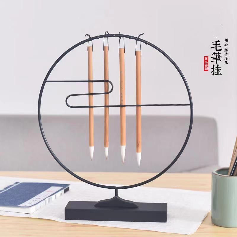 复古简约创意祥云圆形铁艺文房四宝学生初学者入门练字书法国画书房用品摆件晾毛笔搁笔托笔架笔挂展示架属于什么档次？