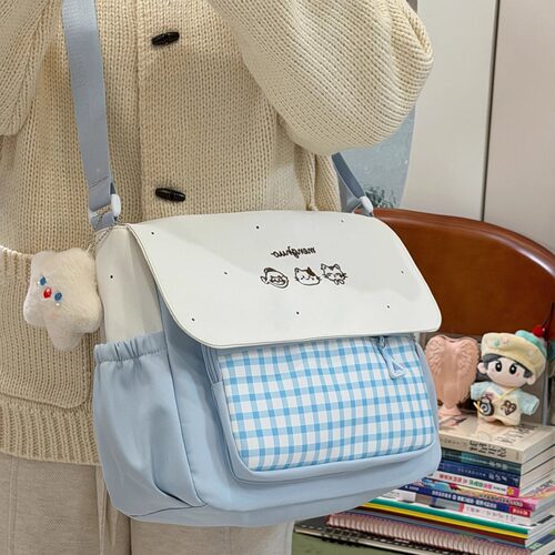茶话会韩系甜美学院风格子邮差包女大容量百搭学生上课单肩斜挎包