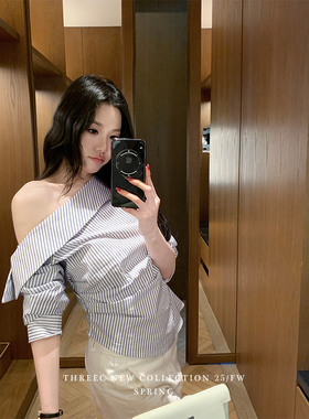 三喜threec “乔妹风 气质蓝色条纹露肩衬衫女宽松设计感小众上衣