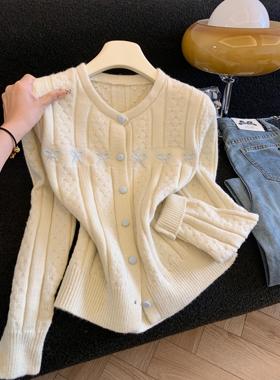欧韩时尚圆领单排扣长袖针织开衫女秋冬宽松软糯毛衣外套潮53428