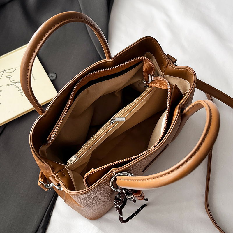 法国小众正品单肩斜挎水桶包