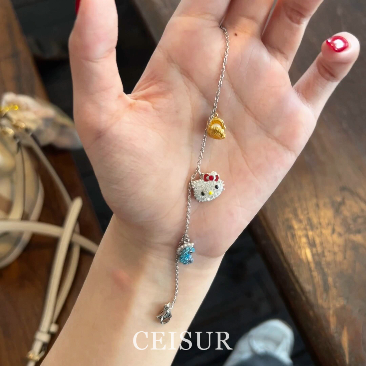 设计款kt猫贝壳海马手链女仿锆石