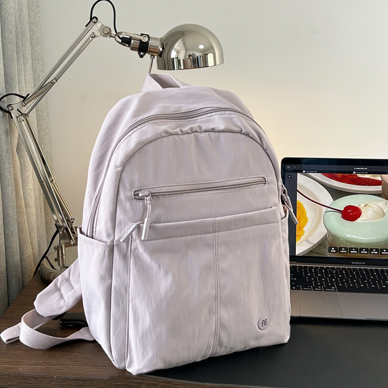 多层小众双肩包休闲简约纯色通勤电脑背包13英寸防水大容量旅行包
