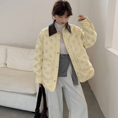 90白鸭绒女原创设计师款羽绒服