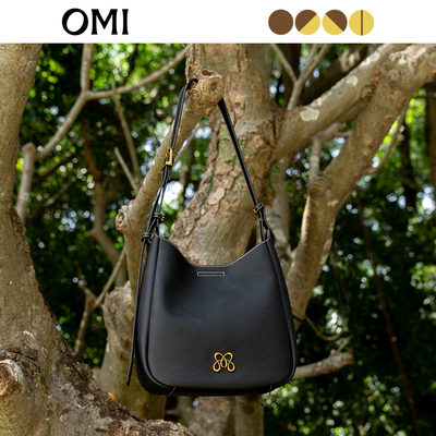 OMI真皮水桶包包女斜跨简约百搭