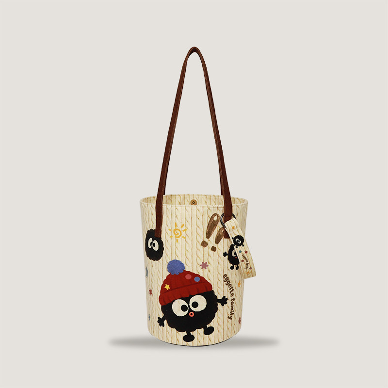 原创可爱卡通煤球帆布桶包女大容量百搭手提斜跨单肩包休闲通勤