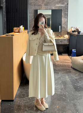 气质温柔米白色花苞裙女2025冬季新款宽松显瘦时尚垂感百搭半身裙