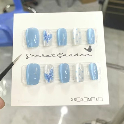 蓝色波点蝴蝶结猫眼穿戴甲