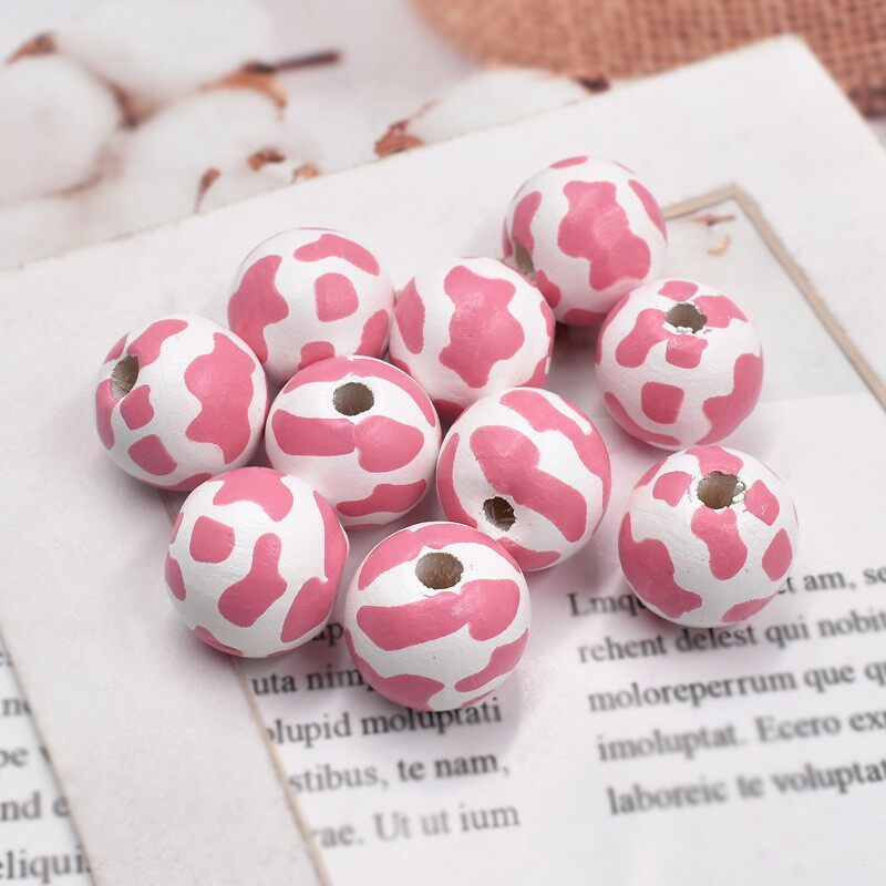 2022新款 16mm禾木白底粉色印花奶牛纹木珠 diy饰品配件原材料