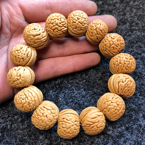 山桃核手串野生柳叶脐蚂蚁纹磨盘