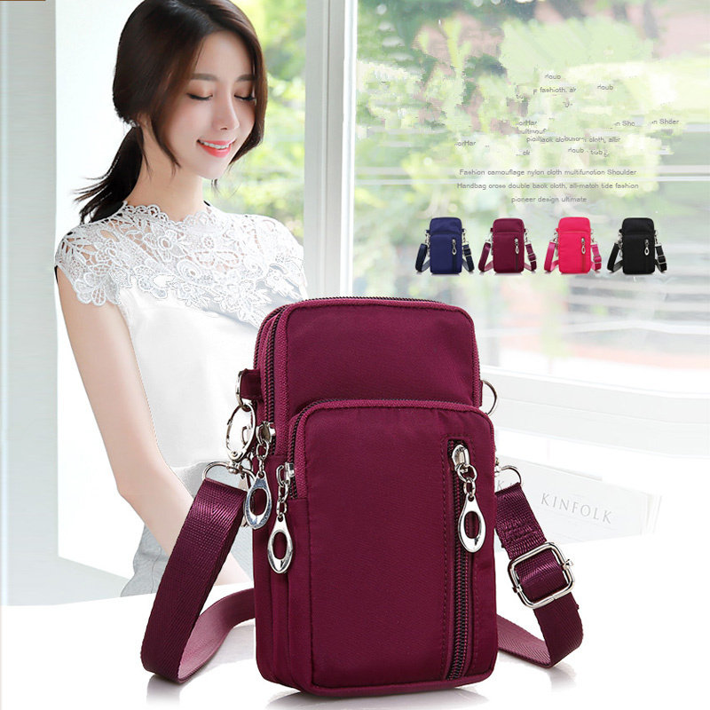 女ins风斜挎手机袋手腕装零钱钥匙包6寸青年可装手机包单肩包竖款