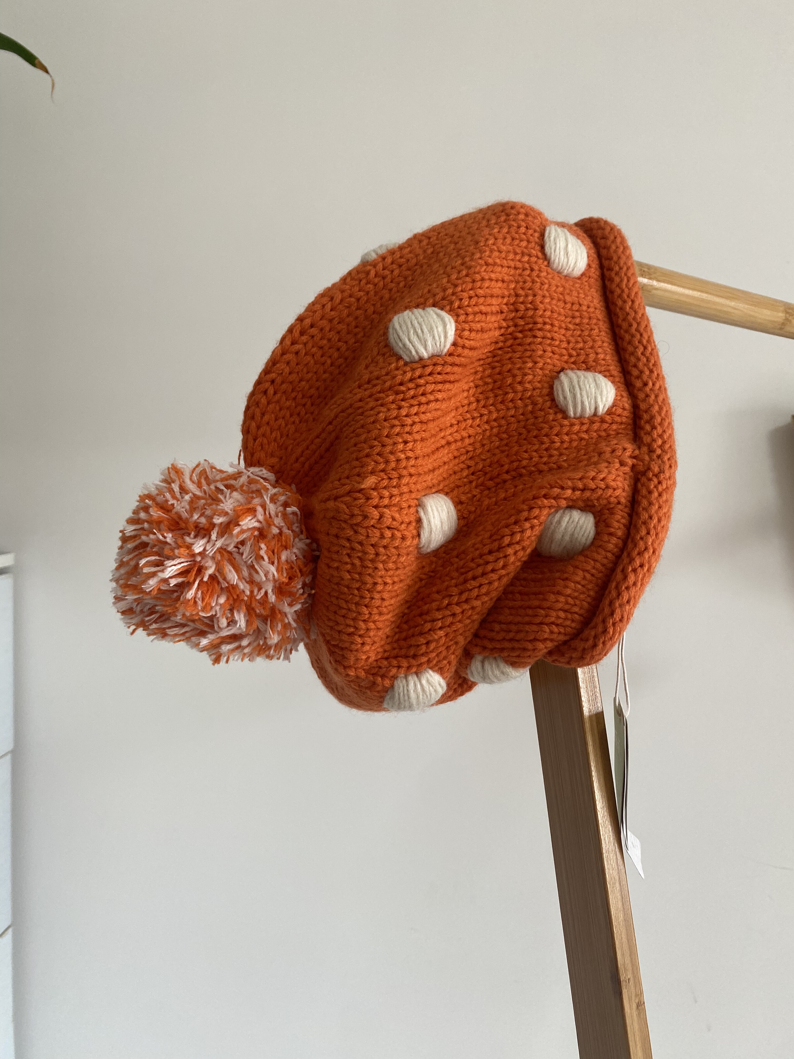 橘色波点保暖大毛球毛线帽子