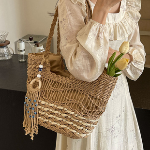 草编海滩包镂空托特包拉菲包包包女式2025新款女士编织腋下沙滩包