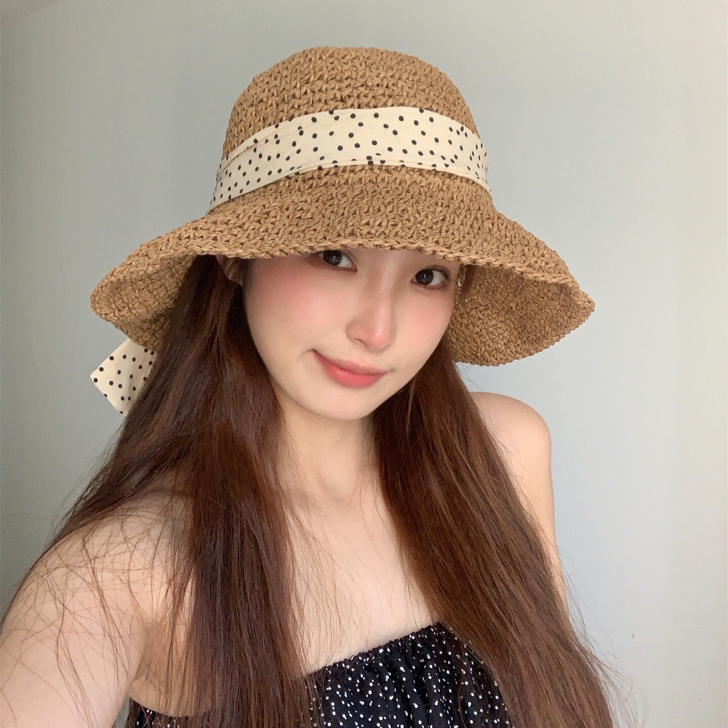 新款波点蝴蝶结编织度假草帽女