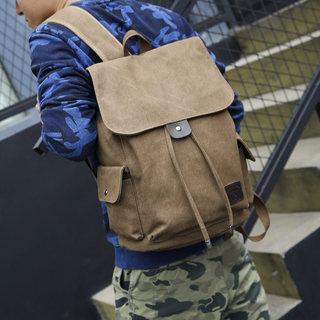 韩版双肩包男时尚潮流帆布桶包休闲旅行包背包高中小学生书包男