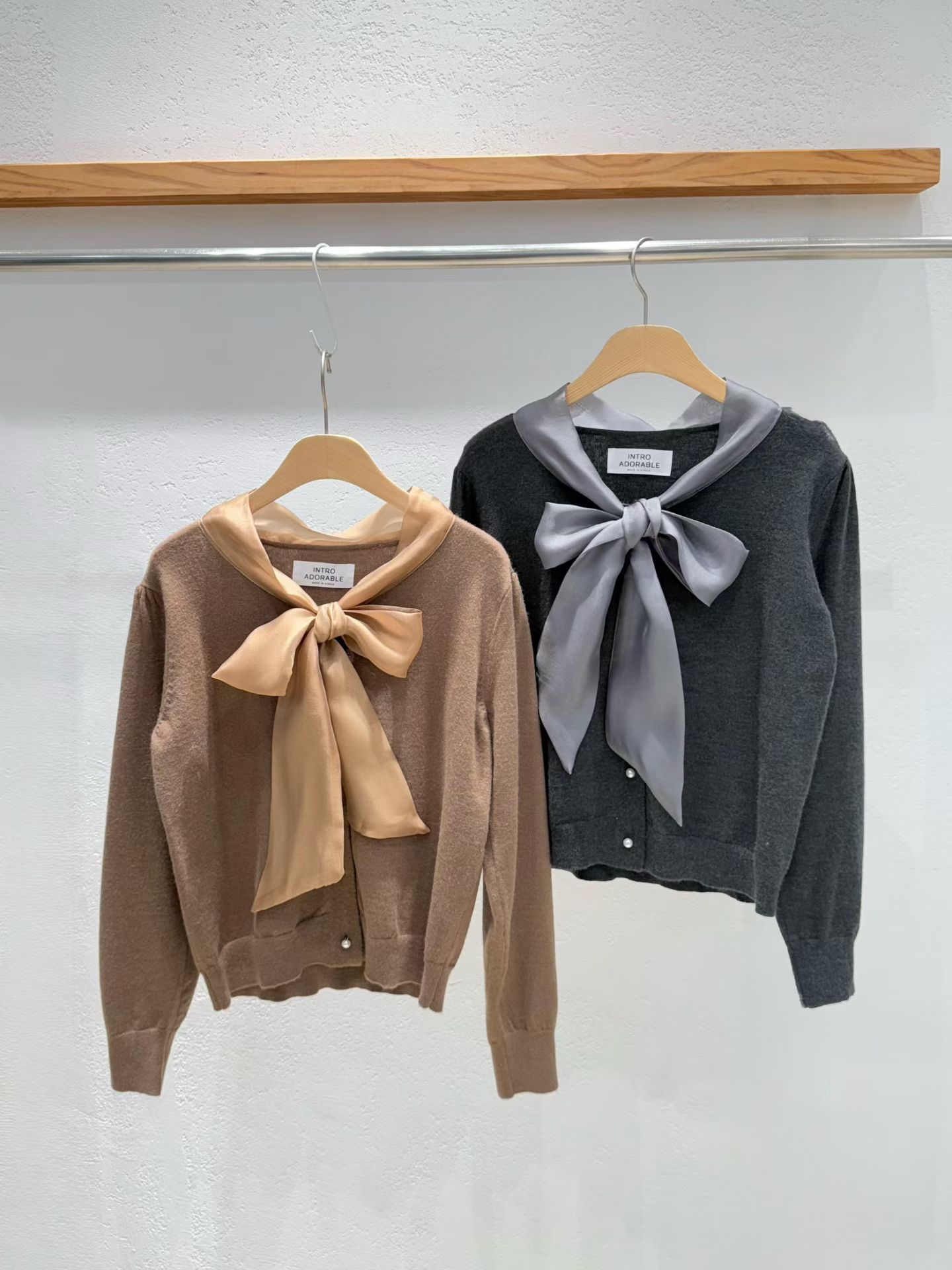 韩国东大门2025冬新款INTRO时尚百搭蝴蝶结针织开衫显瘦毛衣