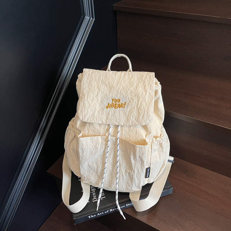 日韩双肩包女2025新款轻便旅游小背包尼龙帆布通勤书包运动登山包