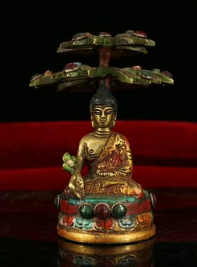 西藏寺院镶嵌宝石彩绘描金佛像