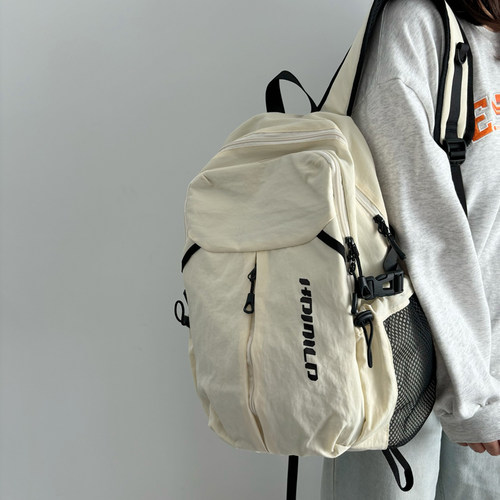 日系轻便减负双肩包女大容量初中高中通勤书包户外登山旅游背包男