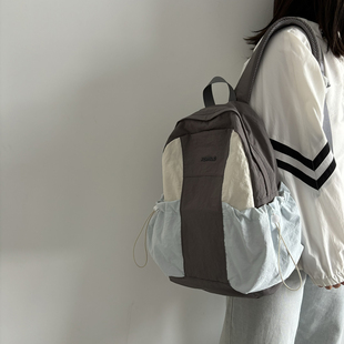 轻便旅游背包女休闲通勤双肩包高中大学生运动登山骑行防泼水书包