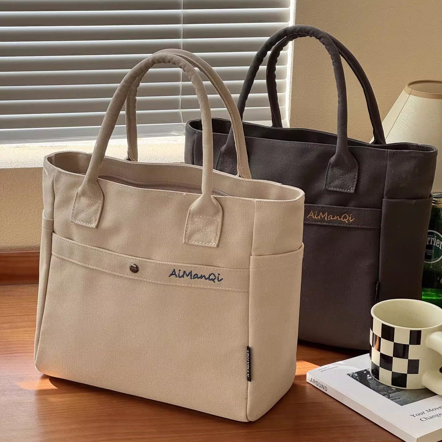 日系简约通勤刺绣加厚帆布手提包文艺日常百搭便携学生餐盒托特包