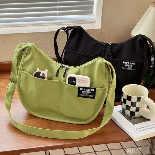 喜凡你日系拉链通勤纯色饺子包