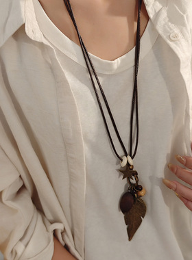 禅意民族风长款羽毛项链复古波西米亚木质海星吊坠毛衣链女多元素