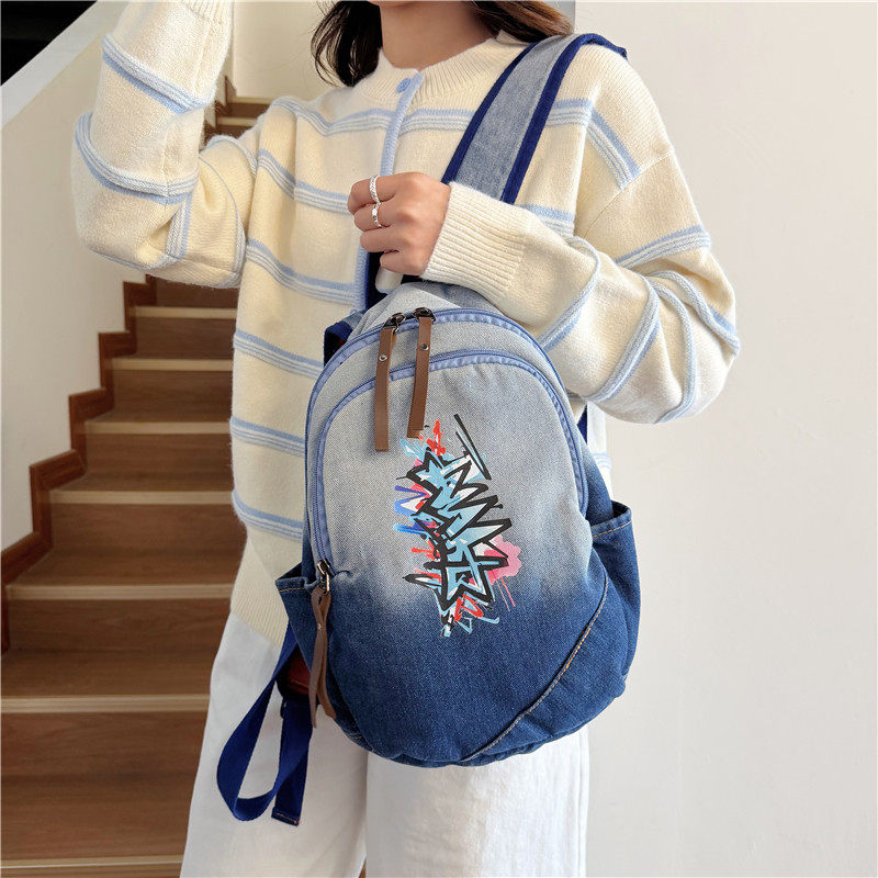 美式个性涂鸦牛仔双肩包创意彩色渐变印花小书包休闲百搭旅行背包