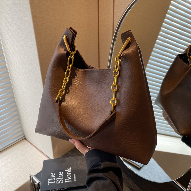 韩版松弛感手提托特包包女2025新款复古百搭通勤单肩包腋下水桶包