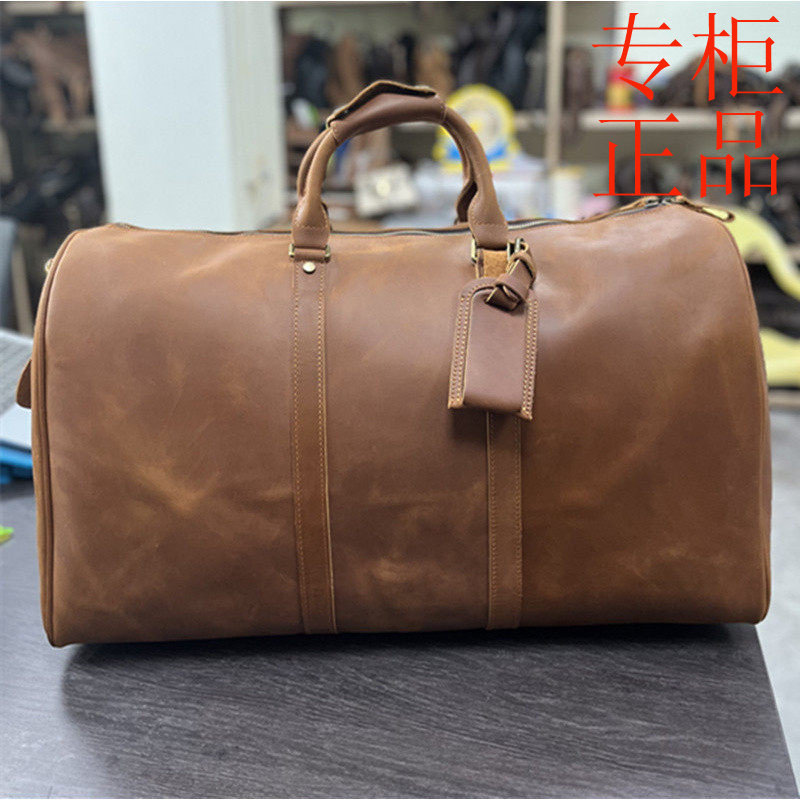 ㊣真皮手提大容量男士旅行包出差免托运开车行李包袋大容量旅行包