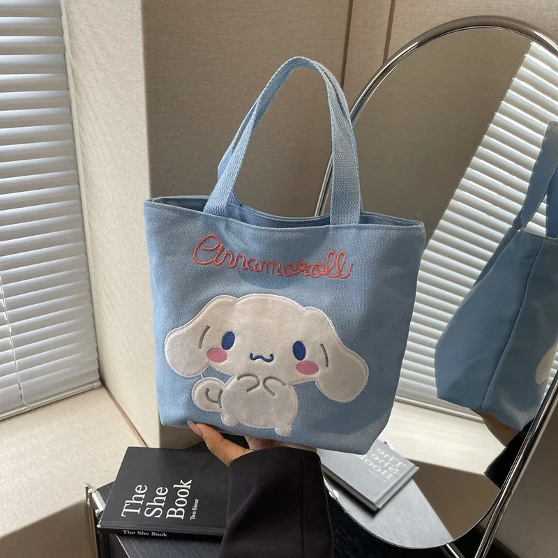 日系简约库洛米帆布小包卡通可爱美乐蒂手提购物袋玉桂狗上课包潮