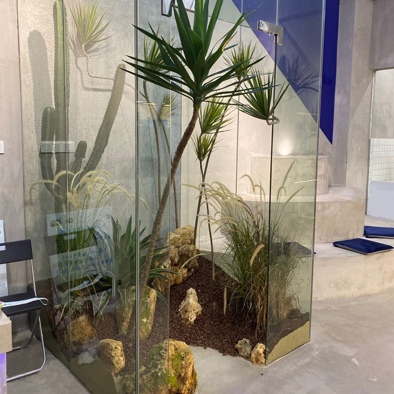 仿真植物装饰铁树石头造景空间绿植景观设计酒店会所橱窗搭配摆件