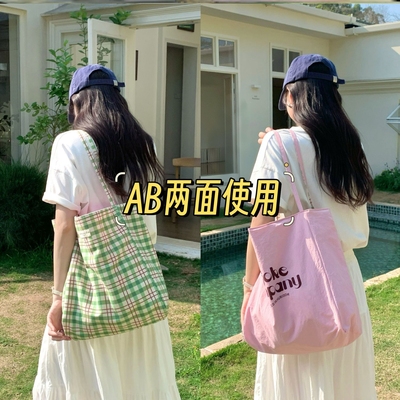 设计师周边迷你蝴蝶结游行旅游出行韩系手提包防水红色条纹帆布包