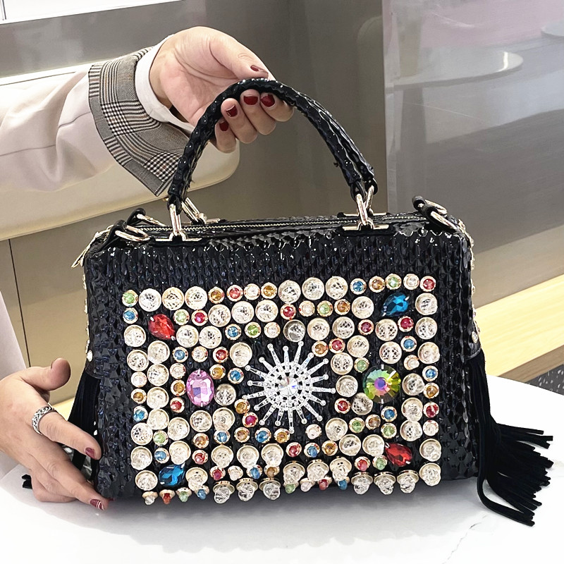 手工缝钻真皮流苏女手提包