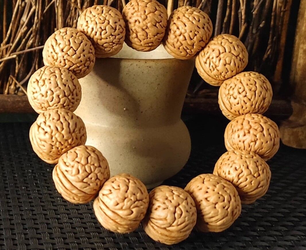 桃核手串苹果园正圆野生精品爆肉脑纹柳叶脐桃核