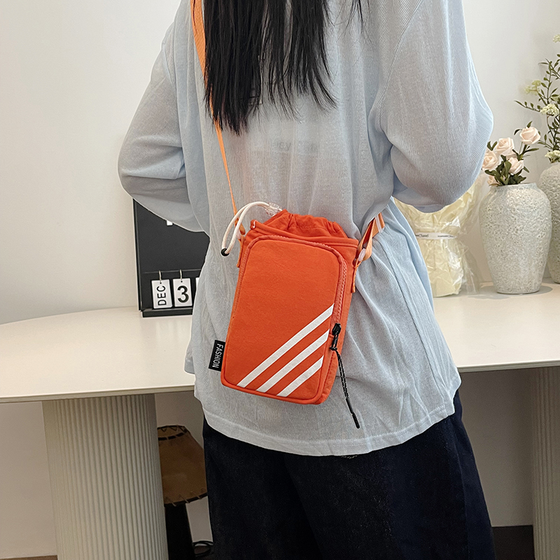 水杯包女新款轻便水壶包束口户外旅行通勤手机包男斜挎包骑行小包