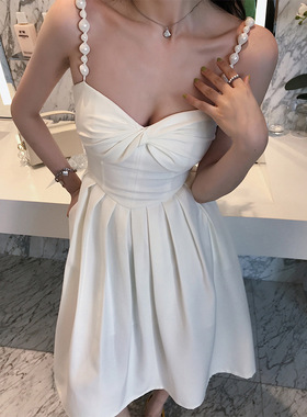 白色礼服女轻奢小众高端级性感吊带V领气质晚宴年会A字收腰连衣裙