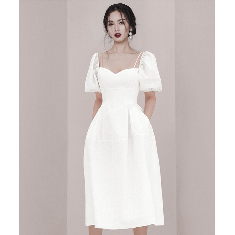 法式性感吊带V领白色礼服女轻奢小众高端级气质名媛A字蓬蓬连衣裙