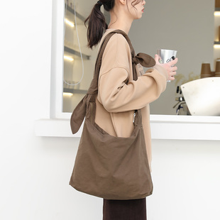 韩系学生上课斜挎帆布包复古休闲蝴蝶结女托特包百搭单肩购物布袋