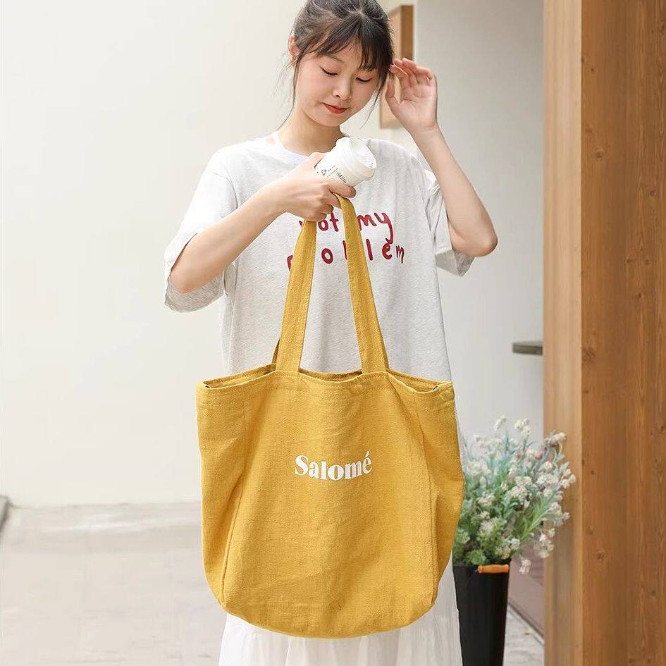 韩版休闲字母帆布袋女百搭大容量单肩斜挎包慵懒风学生上课腋下包