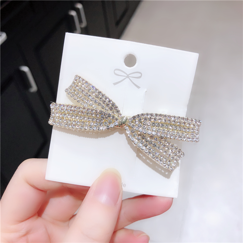 韩国进口珍珠边夹刘海满钻蝴蝶结