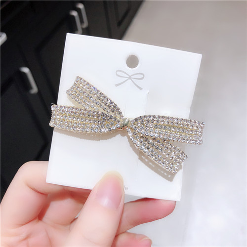 韩国进口珍珠边夹刘海满钻蝴蝶结