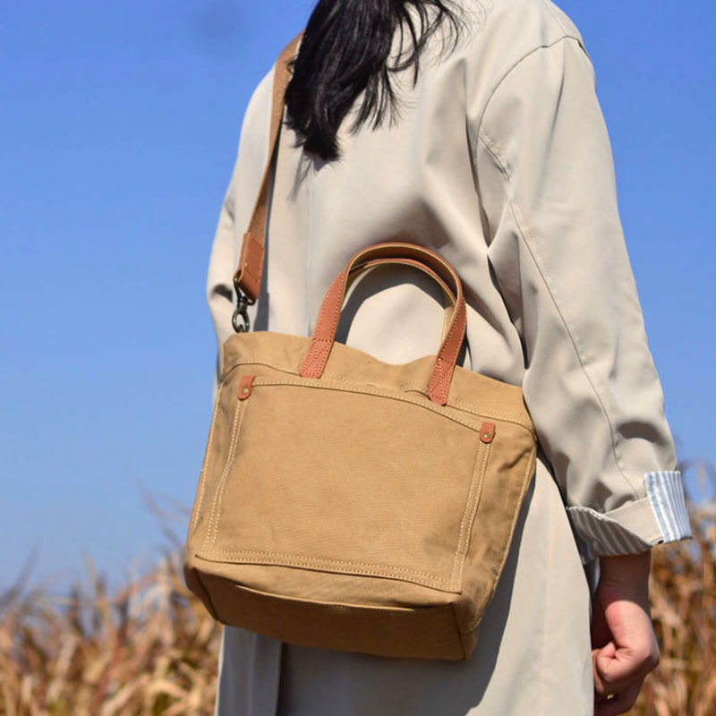 森系百搭日常通勤女斜挎包夏季新款帆布包 配牛皮手提斜挎包