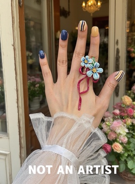 实拍小众别致设计师手工飘逸蝴蝶结珐琅彩釉绽放花朵戒指开口指环