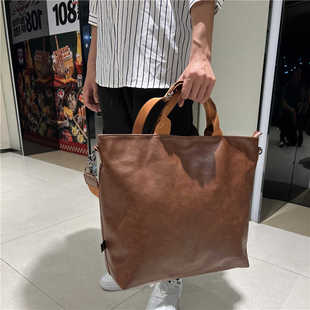 日韩男士手提包软皮斜挎包时尚行李包通勤旅行男大包单肩包女背包