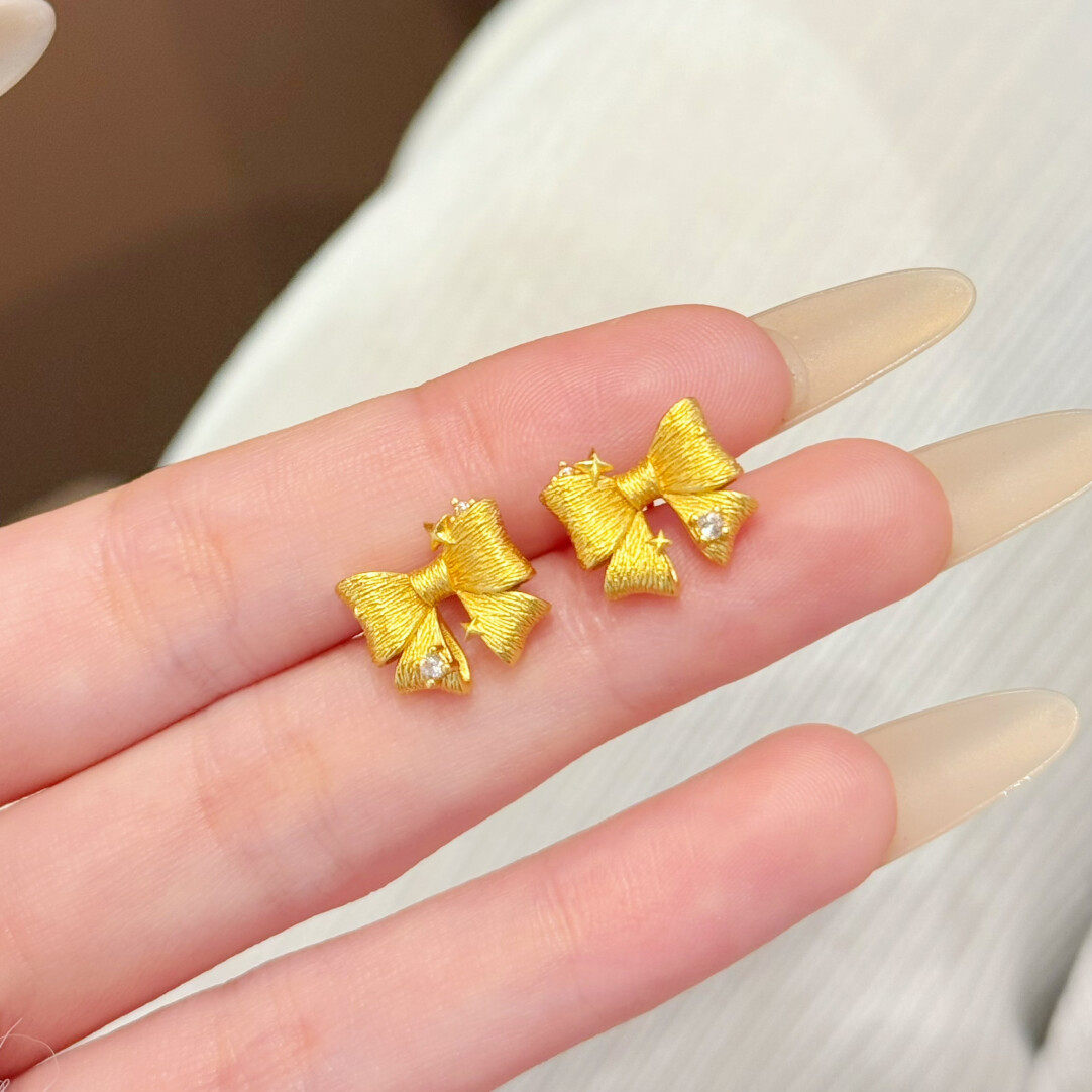 星光蝴蝶结沙金耳钉仿真