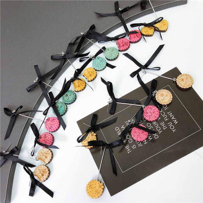 99克拉欧美饰品创意个性仿真曲奇饼干蝴蝶结不对称耳钉耳饰女(RW)